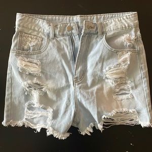 Light washed distressed denim shorts